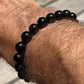 Bracelet Homme en Ambre noir perles parfaitement rondes calibre 9mm