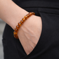 Bracelet femme en Ambre perles baroques cognac 7/8mm