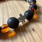 Bracelet en Ambre Cognac | Pierre de Lave | perles 7/8mm | Croix +